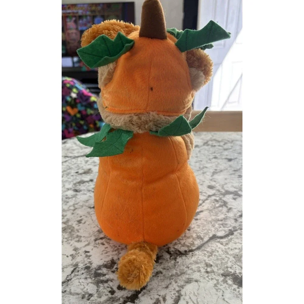 Avon Halloween Singing Dog w/ Trick or Treat Bag Pumpkin Outfit We Got the Treat